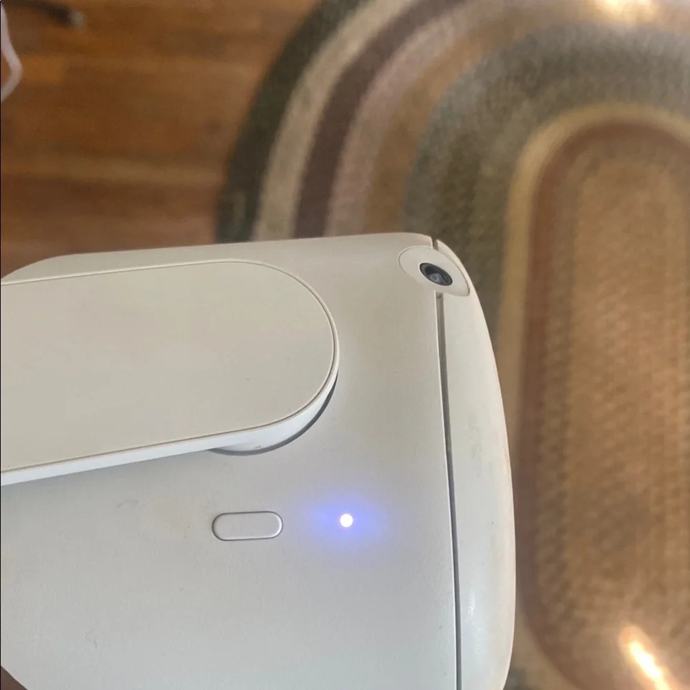 White Device with Blue Light